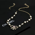 Pearl & Crystal Bow Pendant Necklace