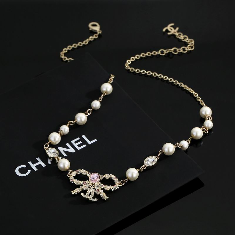 Pearl & Crystal Bow Pendant Necklace