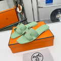 HERMES 0RAN SANDALS IN GREEN PASTEL CALFSKIN